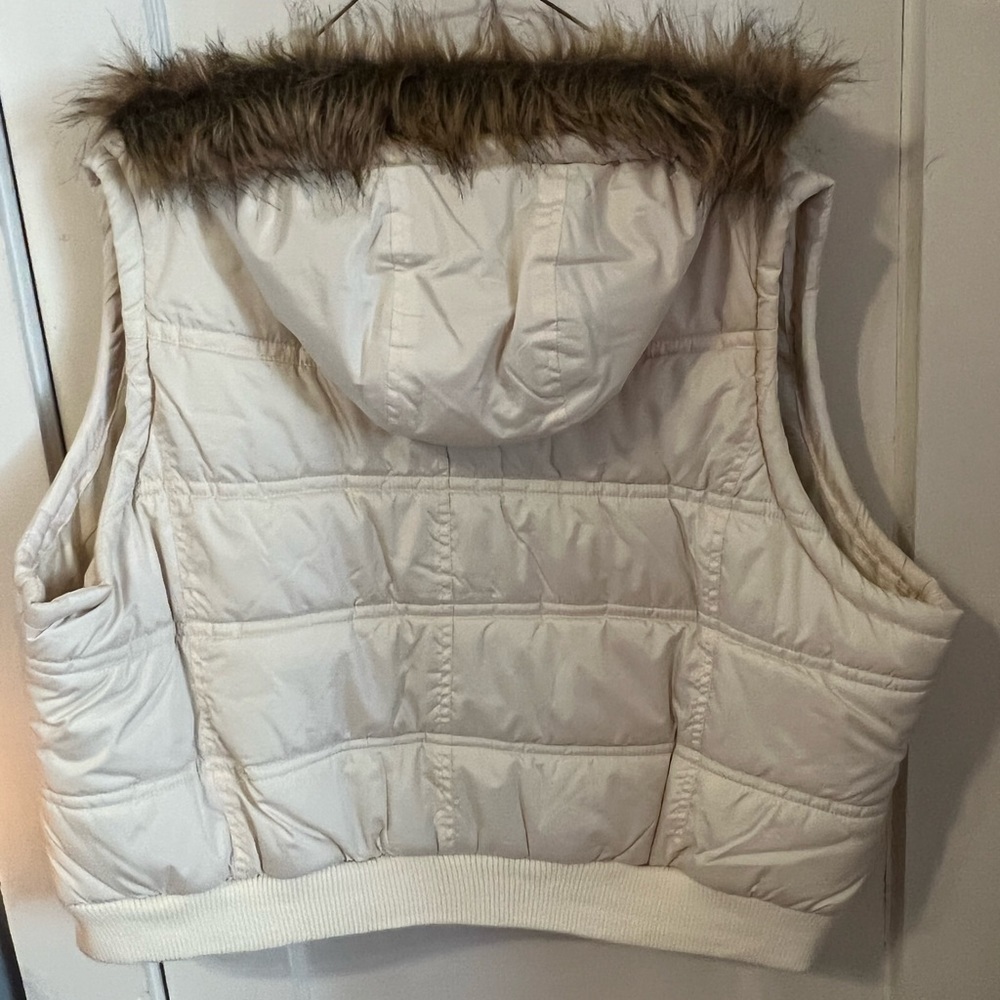 Womens puffy vest with faux fur hood lining